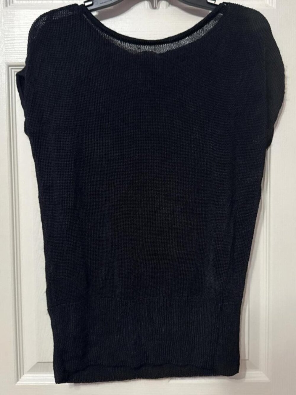 Black sleeveless poncho blouse with mesh details #meshdetail